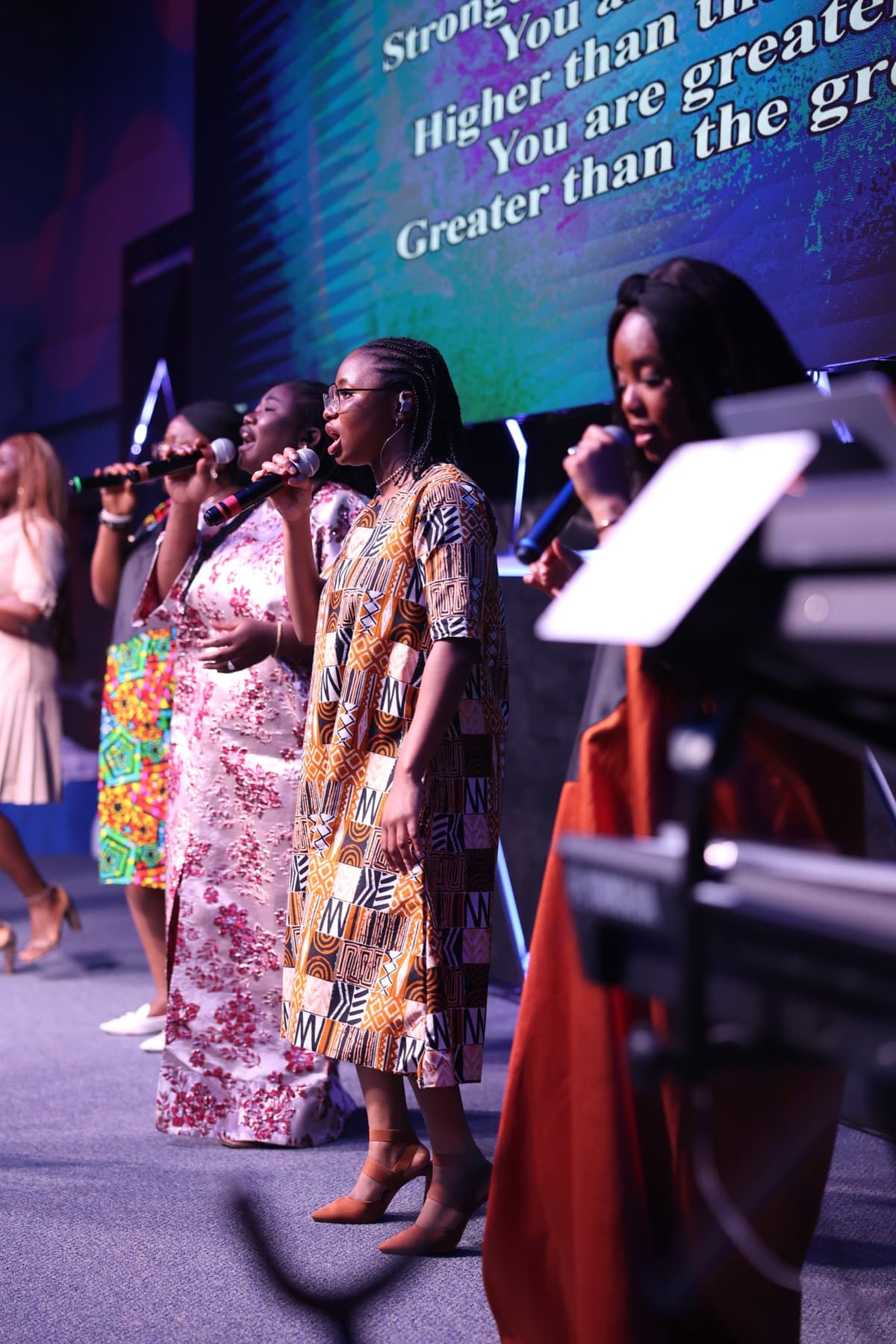 The choir of Amazing Grace Ministries leading the congregation in song